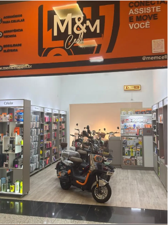 Fachada da loja M&M Cell em Poá